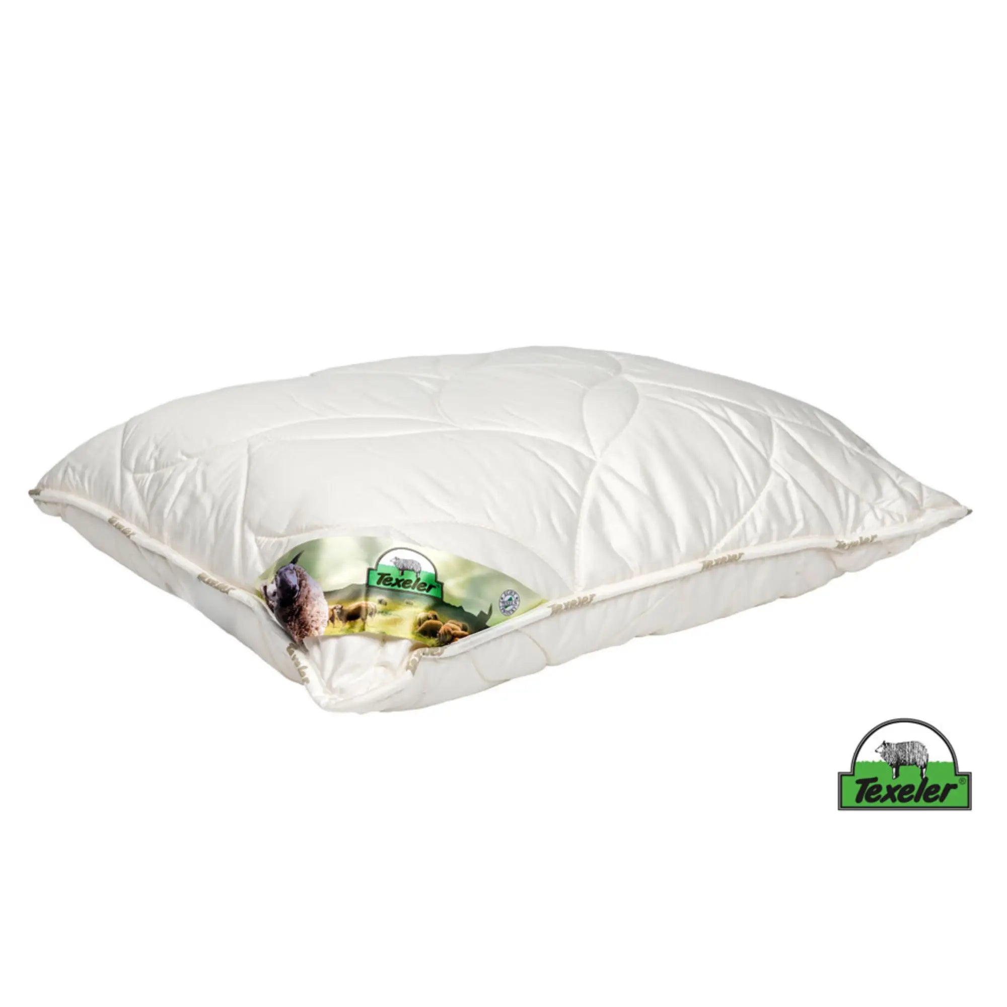 A white pillow with a textured design, featuring a small green and blue logo at the bottom corner. Texeler Soezz Perfection wool pillow with tencel cover. White background and laying flat on the surface